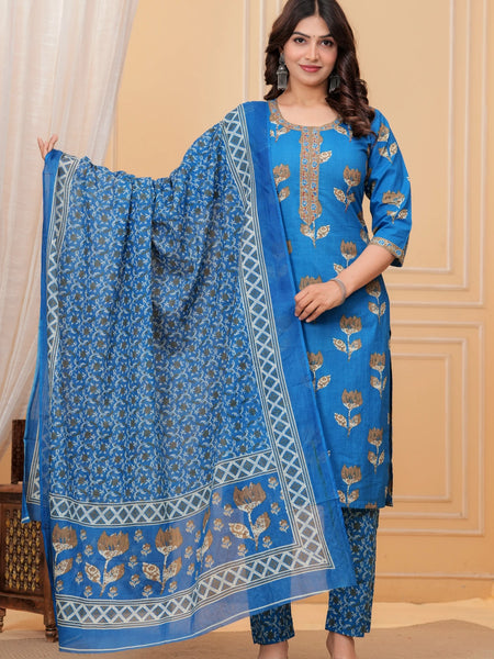 Woman wearing a bright blue handblock printed cotton kurta set with a coordinated Kota Doriya dupatta featuring floral motifs.