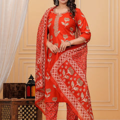 A woman wearing a navy blue handblock printed cotton kurta with a large geometric print dupatta in red, blue, and white.