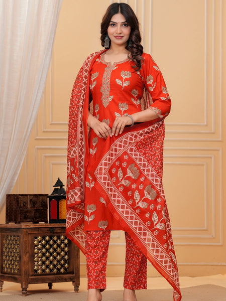 A woman wearing a navy blue handblock printed cotton kurta with a large geometric print dupatta in red, blue, and white.