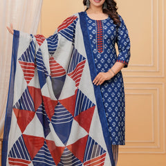 A woman wearing a navy blue handblock printed cotton kurta with a large geometric print dupatta in red, blue, and white.