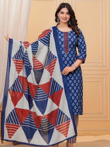 A woman wearing a navy blue handblock printed cotton kurta with a large geometric print dupatta in red, blue, and white.
