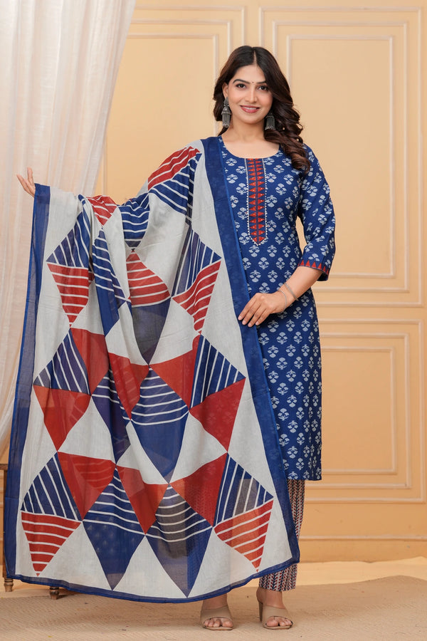 A woman wearing a navy blue handblock printed cotton kurta with a large geometric print dupatta in red, blue, and white.