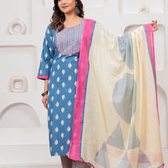 Woman in a blue Jaipur handblock printed cotton kurta with leaf motifs and a designer off-white dupatta with pink borders.