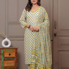 Woman wearing an off-white cotton kurta set with yellow and green Jaipur handblock floral prints and a matching paisley dupatta.