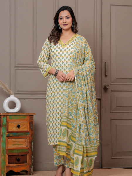 Woman wearing an off-white cotton kurta set with yellow and green Jaipur handblock floral prints and a matching paisley dupatta.