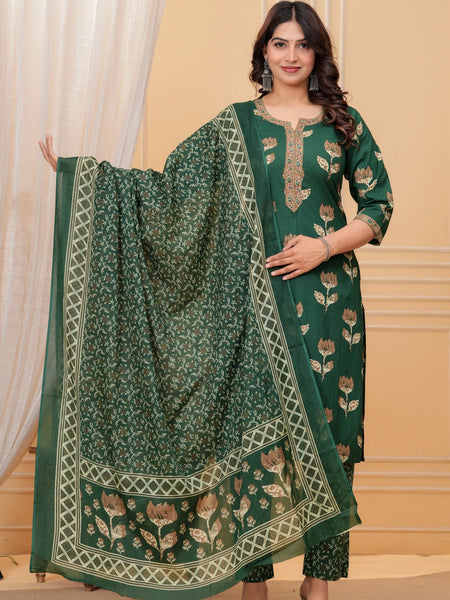 Model posing in a dark green handblock printed straight kurta with an embroidered neck, matching printed pants, and a heavily bordered Chanderi dupatta.