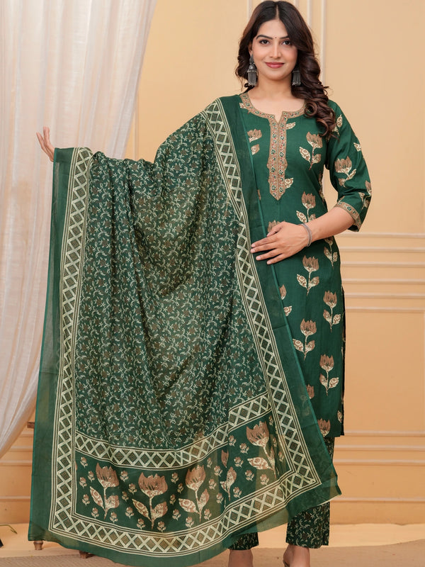 Model posing in a dark green handblock printed straight kurta with an embroidered neck, matching printed pants, and a heavily bordered Chanderi dupatta.